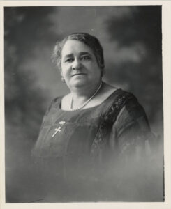 Maggie L. Walker portrait, 3/4 front view with face turned to camera, faded effect at bottom.